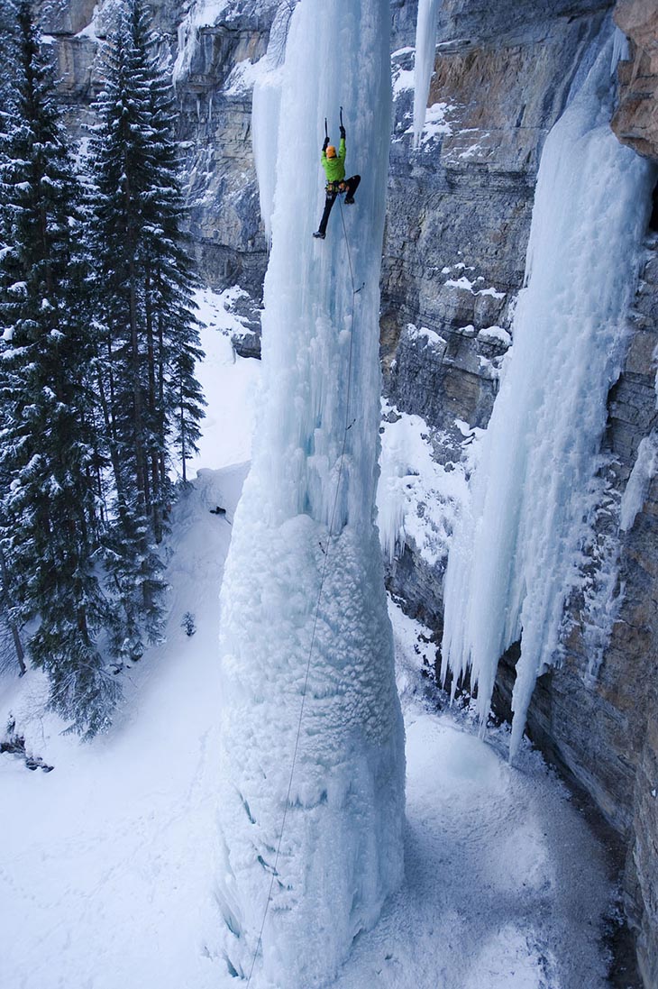 Ice climbing a frozen waterfall