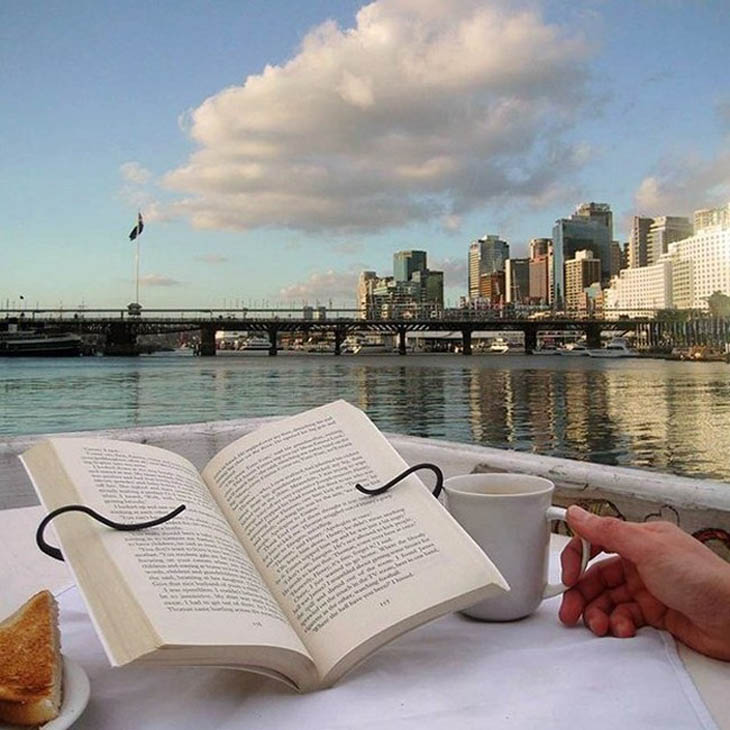 Hands-free book holder keeps your hands free while you read.