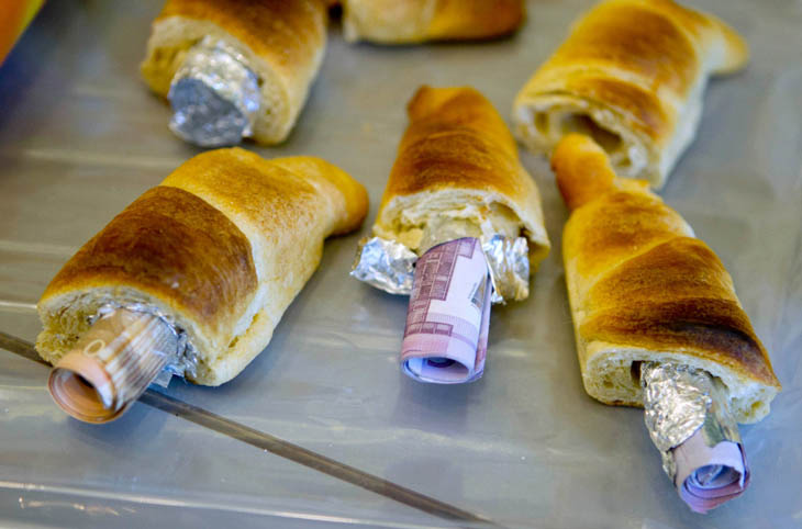 Creative Smuggling Tricks - Money smuggled in pastries.