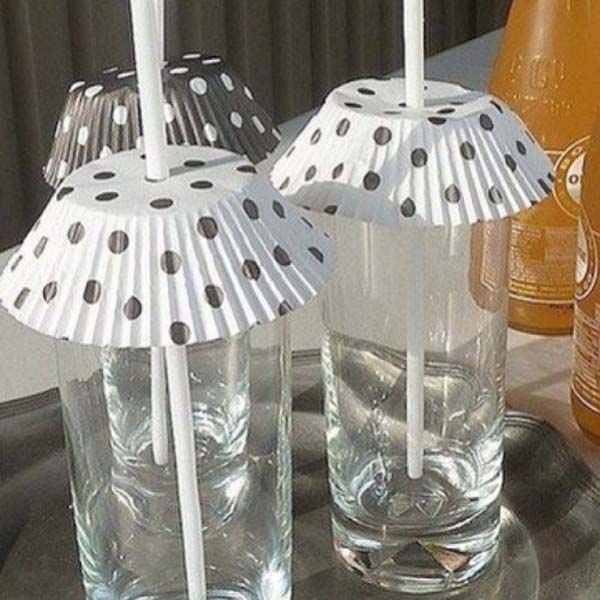 Use muffin liners to keep bugs away from touching your drink.