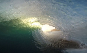 This Guy Took A GoPro Under a Sea Wave and Captured Something Unbelievable.