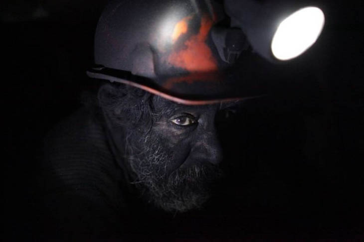 Man working in a coal mine.
