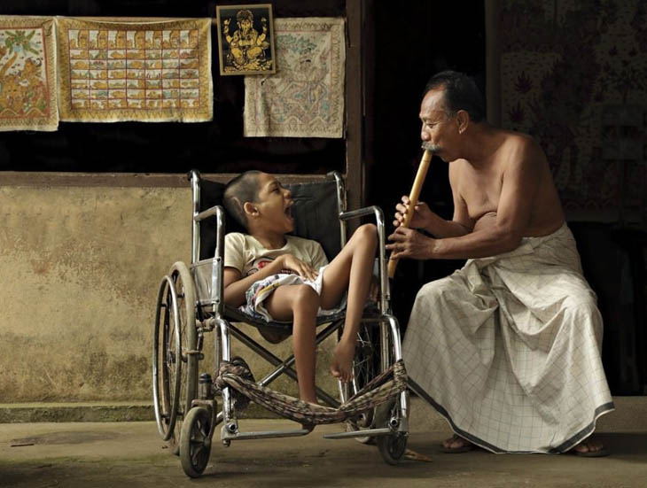 A man was playing bamboo music in Tenganan Village, Bali (2010)