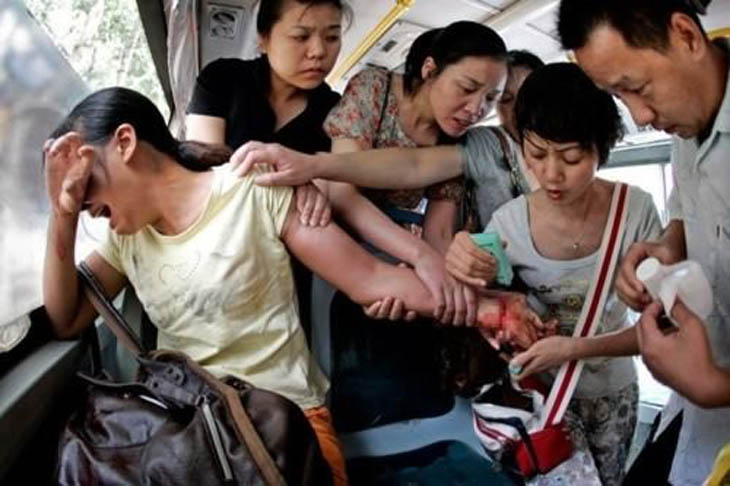 A bus of caring people save a woman who tried to commit suicide in China.