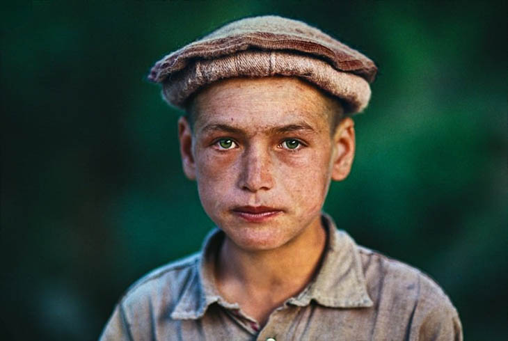 A boy with green eyes from Afghanistan.