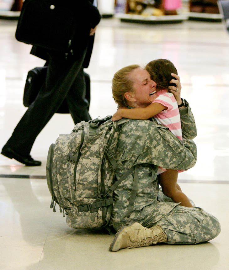 21st century photos - Terri Gurrola is reunited with her daughter after serving in Iraq for 7 months. [2007]