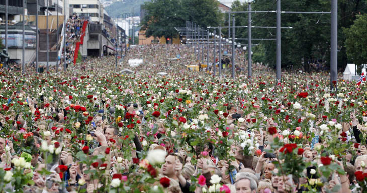 Norwegian citizens hold a flower march after terrorist attacks by Anders Breivik killed 77