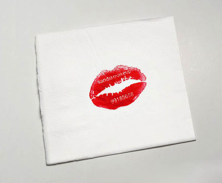 Make up business cards made with lipstick.