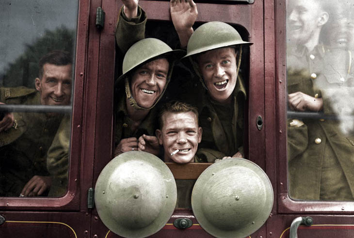 British troops cheerfully board their train