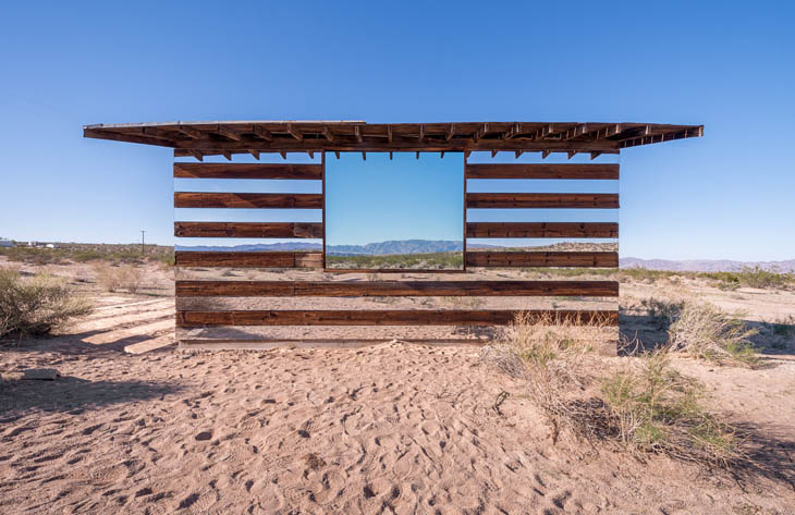 The reflective cabin appears almost transparent