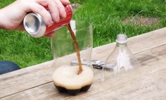 He Cuts The Top Off A Bottle And Pours A Can Of Coke Inside. Why? It’s GENIUS!