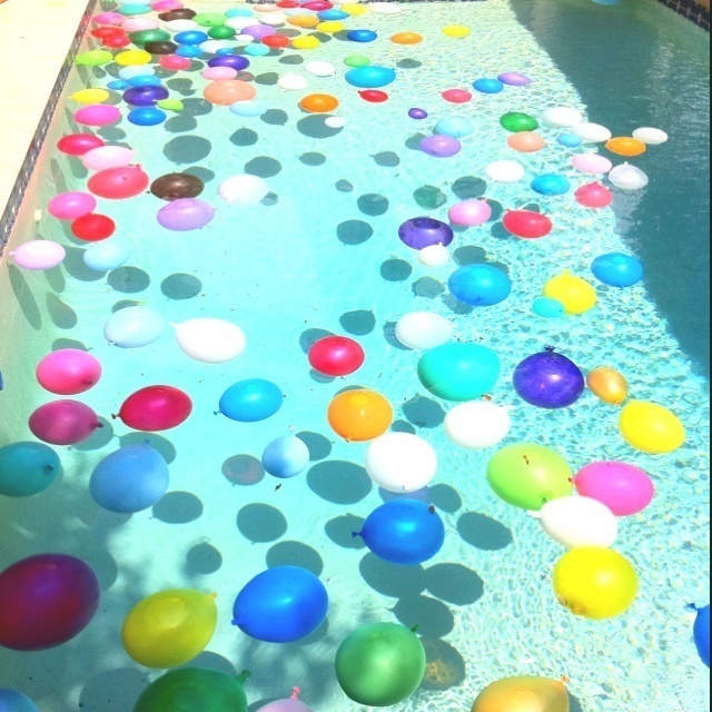 Float water balloon in a pool.