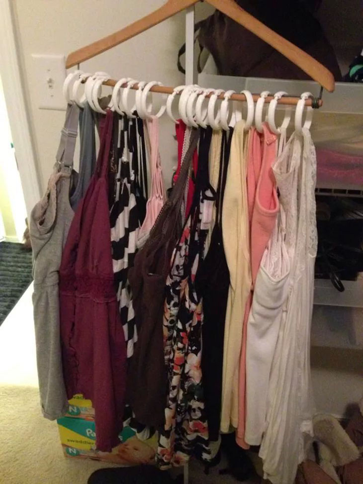 Put all of your tank tops on one hanger.