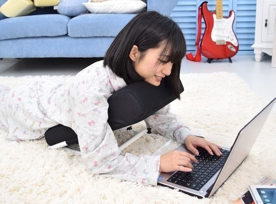 A cushion you can rest/lean on while you're lying on the floor doing work.