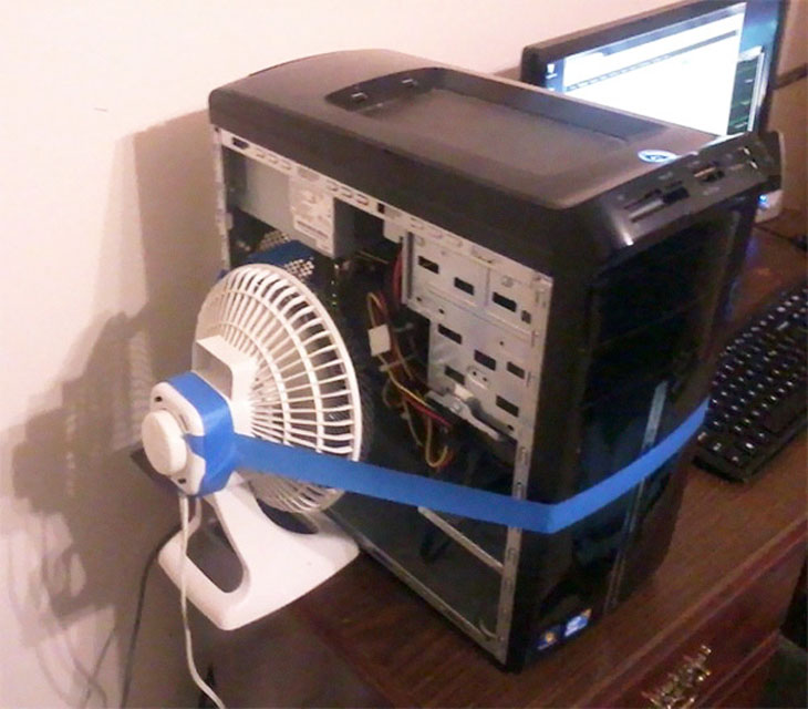 Painter's Tape And A Fan Are All That's Keeping This Desktop From Overheating