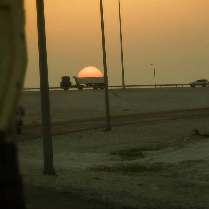 Snapped a lucky shot of a truck trying to steal the sun.