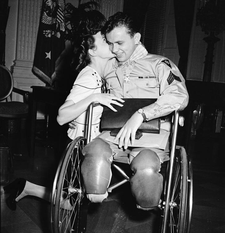 Wartime photos:Jean Moore Kneels And Kisses Her Fiancé, Wheelchair-Bound World War II Veteran Ralph Neppel, 1945