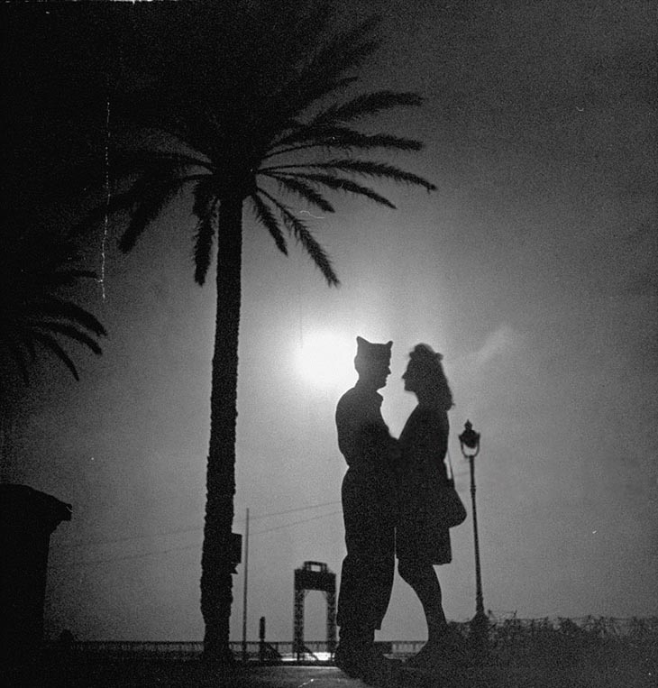 An American GI And His French Girlfriend Holding One Another While On A Date, 1940s
