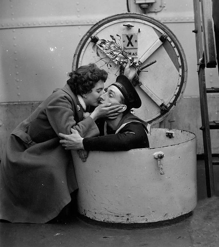 D. Brown Kissing Her Fiance Terry Under The Mistletoe, On Board The HMS Wakeful At Portsmout, 1955